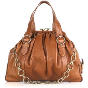 http://www.purseblog.com/marc-jacobs/marc-jacobs-karen-leather-frame-handbag.html