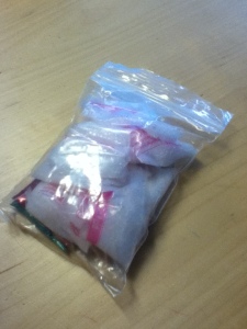 The plastic wrap also enclosed to bags of body glitter